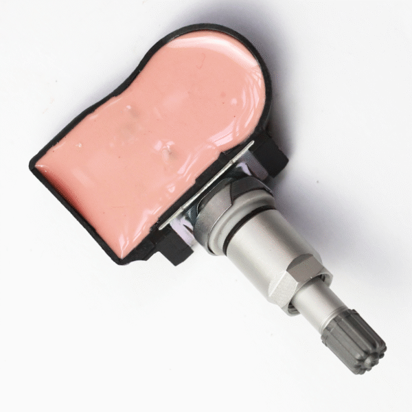 Close-up view of the Mazda TPMS sensor BBM237140B with cover