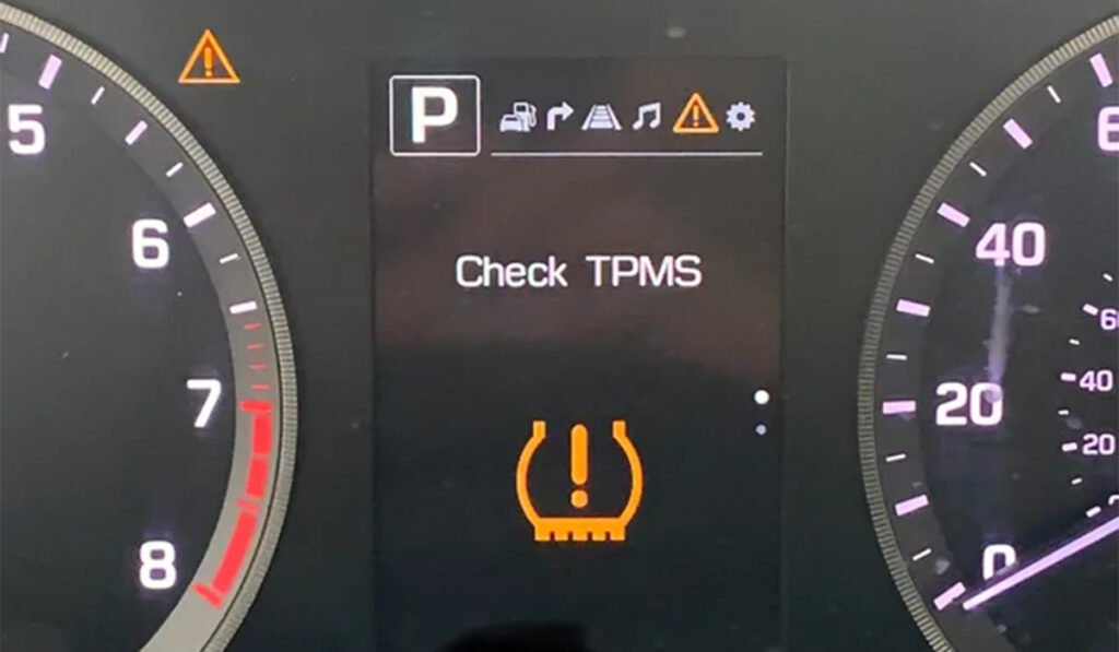 Check TPMS warning light on the dashboard, indicating a tire pressure issue.