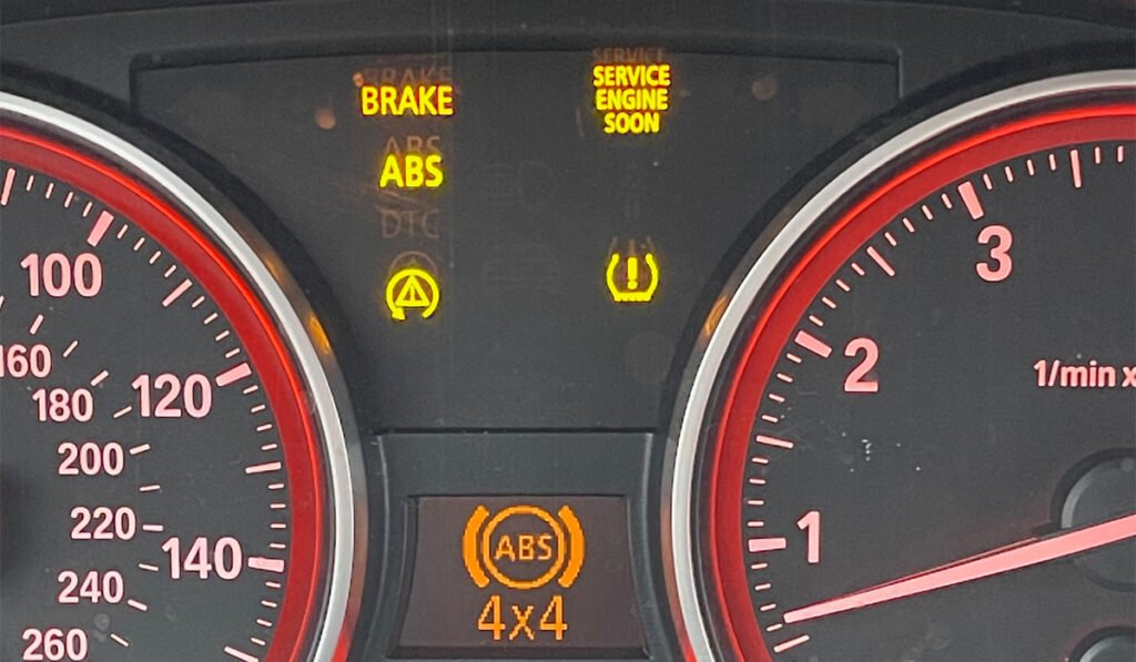 Car Dashboard with TPMS and ABS Light On Together