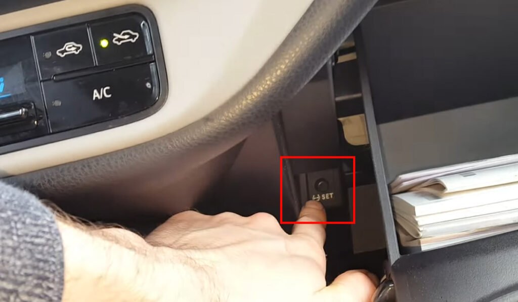 Location of the TPMS reset button, used to fix the TPMS Light Blinking issue.
