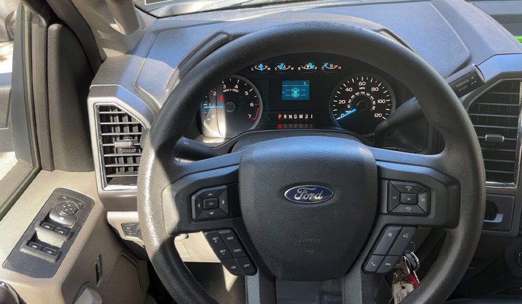Car displaying TPMS malfunction warning while driving