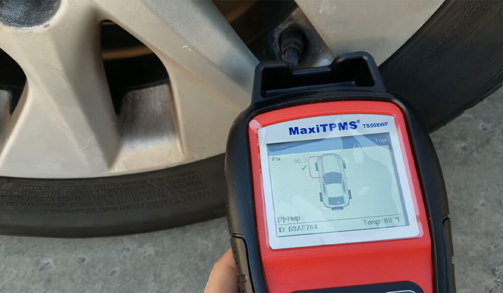 TPMS sensor matching process for front and rear wheel positions, emphasizing correct sensor placement.