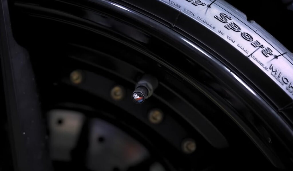 Illustration of valve stem TPMS sensor showing front and rear wheel position differentiation