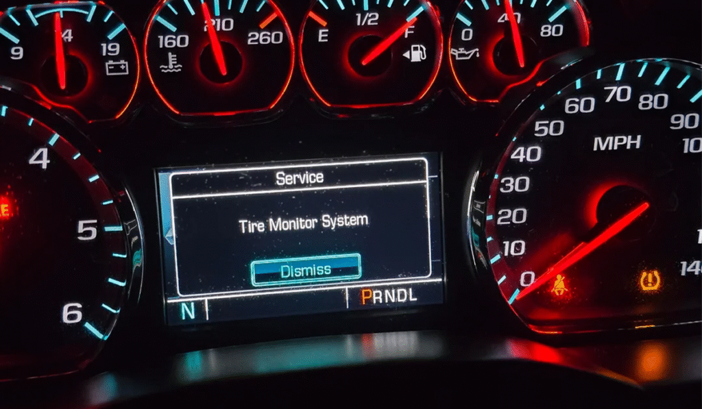 Autel TPMS tire pressure warning light on dashboard indicating low tire pressure